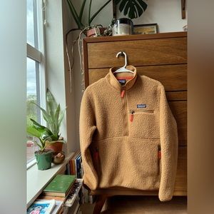 Orangey brown Patagonia retro pile marsupial.